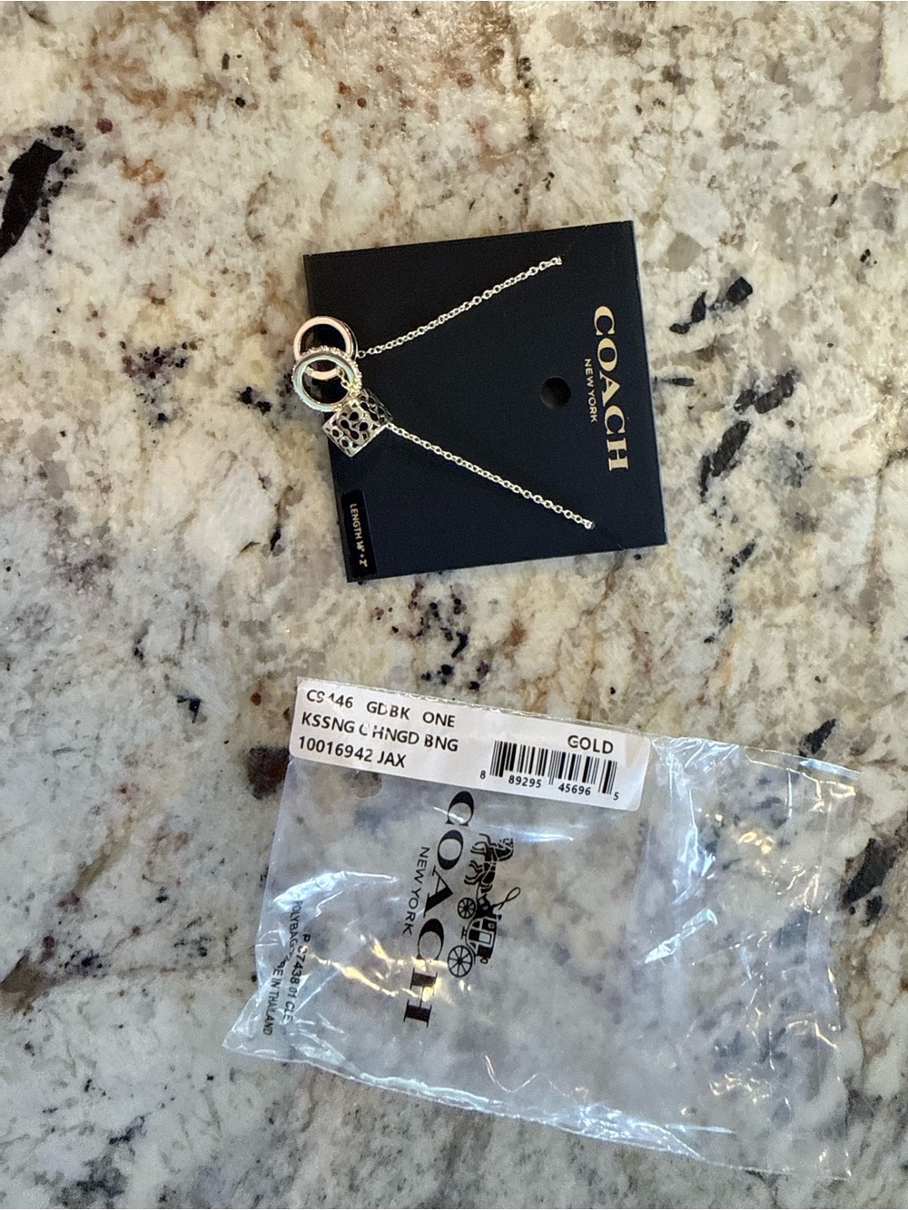 Coach Gold-Tone Interlocking Ring Drop Necklace